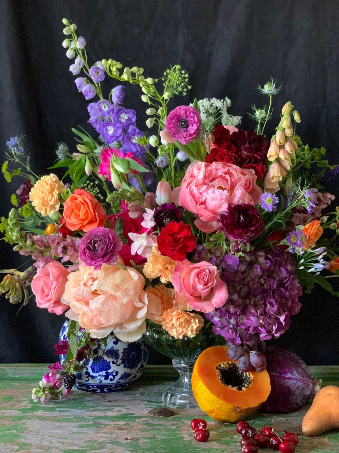 A vibrant floral bouquet in a decorative vase with assorted flowers.